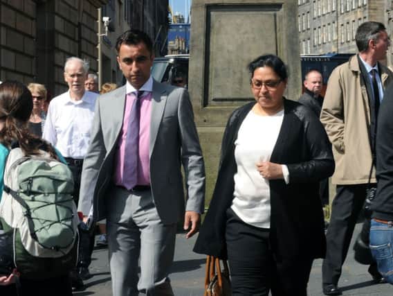 The familys lawyer Aamer Anwar with Surjits sister Manjit. Picture: Lisa Ferguson