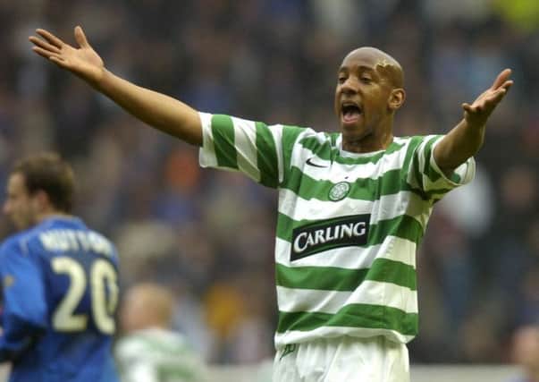 Dion Dublin pictured during his first game for Celtic - an Old Firm match at Ibrox. Picture: David Moir