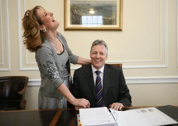 Peter Robinson and his wife Iris, pictured shortly after he was installed as First Minister. Picture: PA