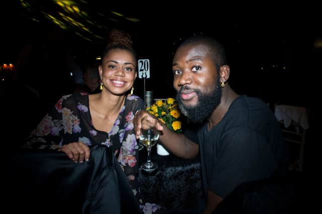 Caroline Crawford and friend Alloysious Massaquoi from the Young Fathers. Picture: Alex Hewitt