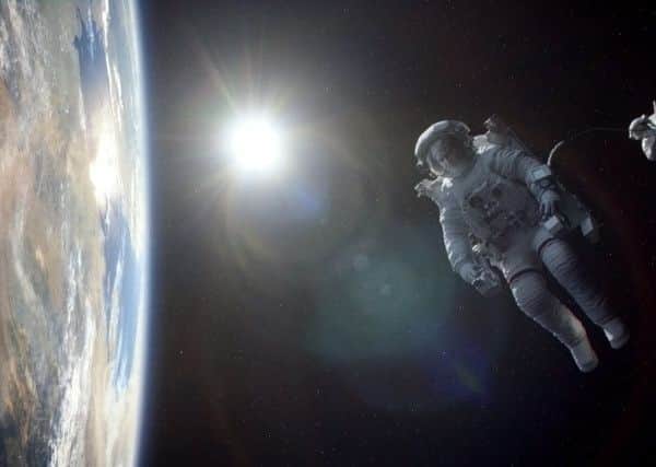 The characters get great views of the Blue Planet in Gravity. Picture: PA