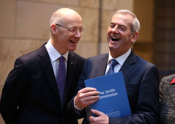 John Swinney seemed gleeful alongside Lord Smith on publication of his report. Picture: Getty