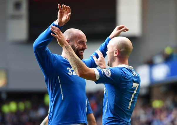 Rangers' Nicky Law celebrates his strike with fellow goalscorer Kris Boyd. Picture: SNS