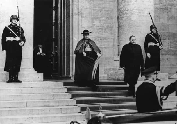 Controversial wartime Vatican figure Monsignor Cesare Orsenigo leaves a reception hosted by Adolf Hitler. Picture: Keystone/Getty