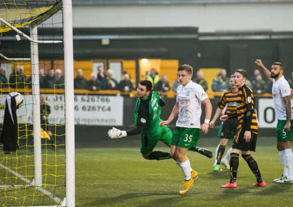 Alloa goalkeeper Craig McDowall is helpless as a header from David Gray (out of picture) loops into the net. Picture: Ian Georgeson