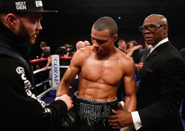 A disappointed Chris Eubank Jr after his points defeat by Billy Joe Saunders, with his famous father in attendance. Picture: Getty