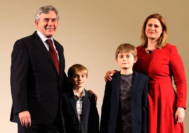 Former Prime Minister Gordon Brown with his family, wife Sarah and children John (11) and Fraser (8). Picture: PA