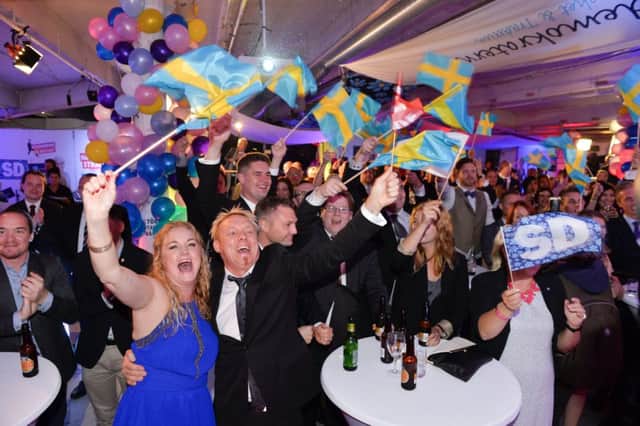 Supporters of the Sweden Democrats celebrate in Stockholm after the Swedish general elections on September 14. Picture: Getty