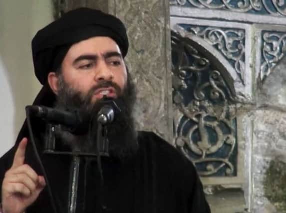 Islamic States reclusive leader Abu Bakr al-Baghdadi  his wife and son are reported to have been held in Lebanon. Picture: AP