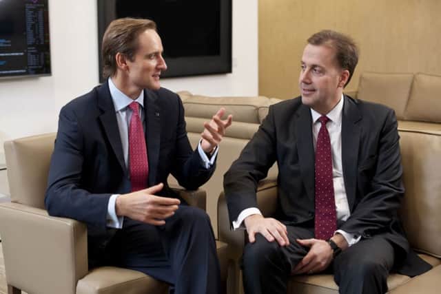 Aviva chief Mark Wilson with Friends Life chief Andy Briggs. Picture: PA