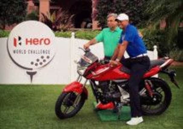 Tiger Woods celebrates clinching a new sponsorship with Hero Motor Group. Picture: PGA Tour