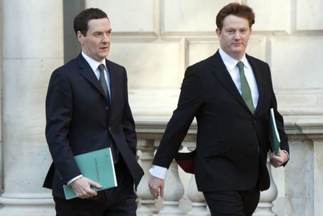 George Osborne and Danny Alexander make their way to the Commons chamber. Picture: Getty