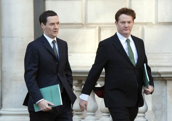 George Osborne and Danny Alexander make their way to the Commons chamber. Picture: Getty