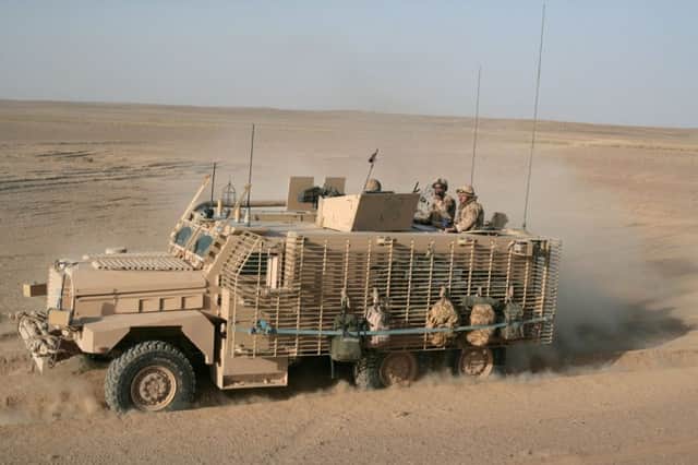 A Mastiff at work in Helmand. Damage to its doors may have contributed to death of three Scots soldiers. Picture: Getty
