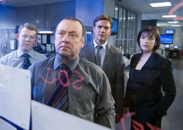 Alex Norton (second from left) with the cast of Taggart. Picture: Contributed
