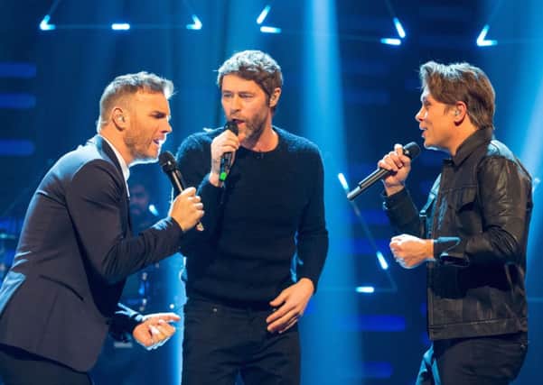 Remaining members of Take That (left to right) Gary Barlow, Howard Donald and Mark Owen. Picture: Contributed
