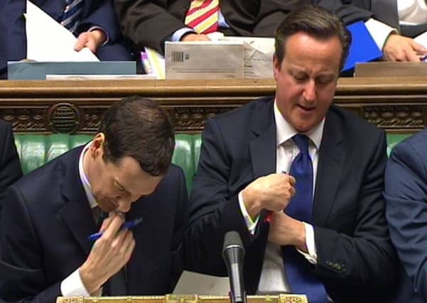 George Osborne, left, and David Cameron have slammed the BBC over its 'hyperbolic' coverage of the Autumn Statement. Picture: PA