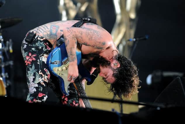 Biffy Clyro frontman Simon Neil was in his usual shirtless form. Picture: Lisa Ferguson