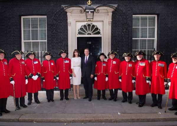 David Cameron and his wife Samantha posed with Chelsea pensioners for their picture outside 10 Downing Street. Picture: Contributed