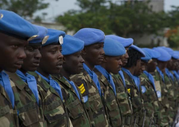 Members of the UN peacekeeping force in Darfur, where it is alleged government-allied troops raped 200 women and girls Picture: Getty