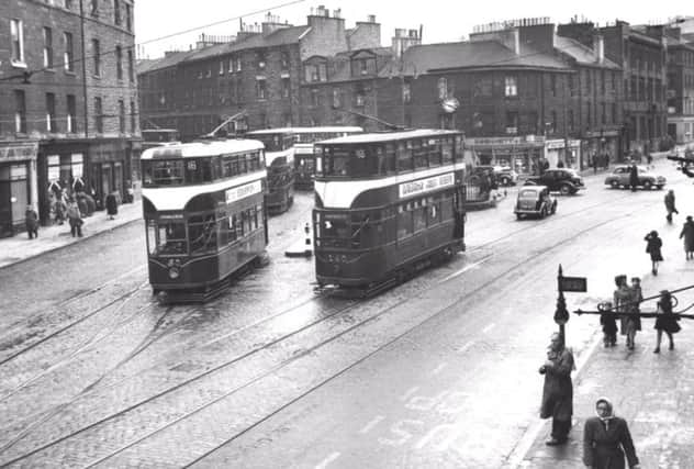 Two trams at the Tollcross Tramway Junction in September 1952. Picture: TSPL