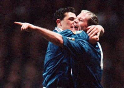 Paul Gascoigne celebrates his second goal with Rangers team-mate Charlie Miller. Picture: SNS