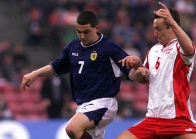 Charlie Miller in action for Scotland against Poland. Picture: SNS