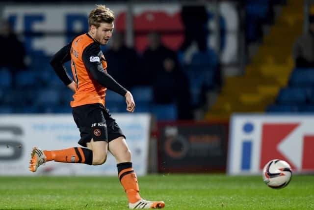 Stuart Armstong doubles Dundee Utd's lead. Picture: SNS