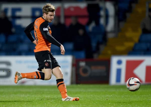 Stuart Armstong doubles Dundee Utd's lead. Picture: SNS