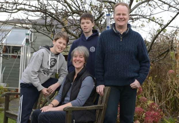 Rachel Mayhew, with husband John and sons Robbie and Ally. Picture: Andrew OBrien