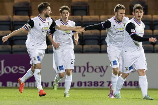 The ICT players celebrate after Ryan Christie (2nd left) grabbed a late winner. Picture: SNS