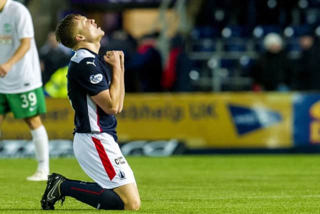 Peter Grant celebrates Falkirk's win at full-time. Picture: SNS