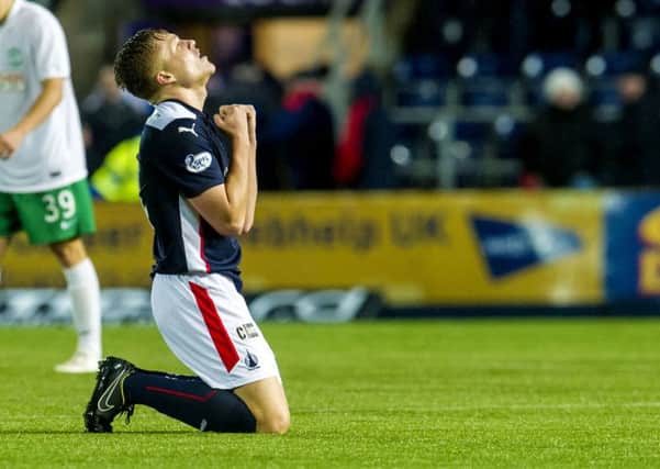 Peter Grant celebrates Falkirk's win at full-time. Picture: SNS