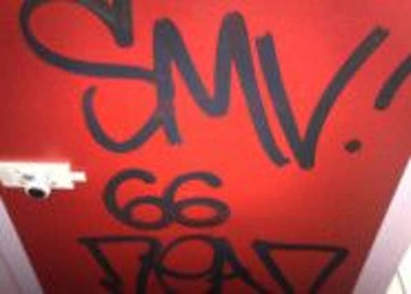 A photograph that shows vandalism in Tynecastle's Roseburn stand