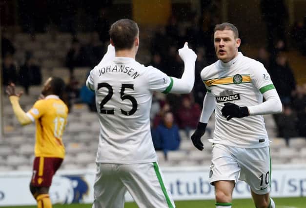 Anthony Stokes celebrates his early goal for Celtic with provider Stefan Johansen. Picture: SNS