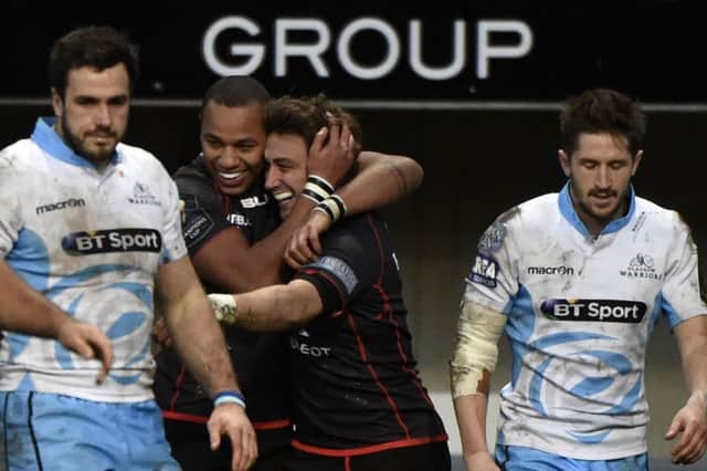 Toulouse's Maxime Medard, centre, is congratuled after scoring. Picture: Getty