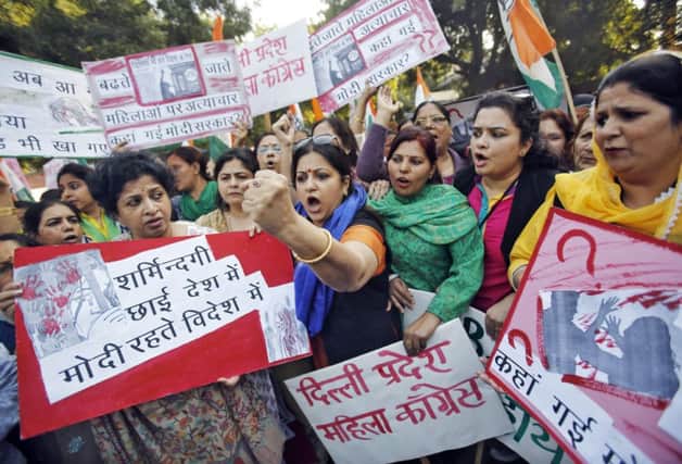 Members of the womens wing of Indias Congress Party staged a protest in Delhi over the alleged taxi rape. Picture: Reuters