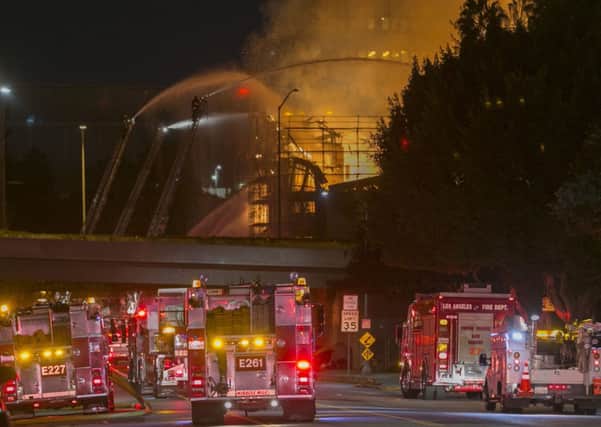 Los Angeles Fire Department spokesman David Ortiz said more than 250 firefighters are battling the blaze. Picture: AP