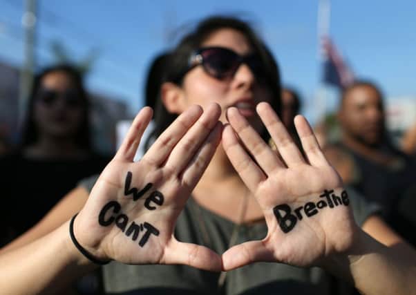 A demonstration in Miami, Florida, one of many which have broken out. Picture: Getty Images