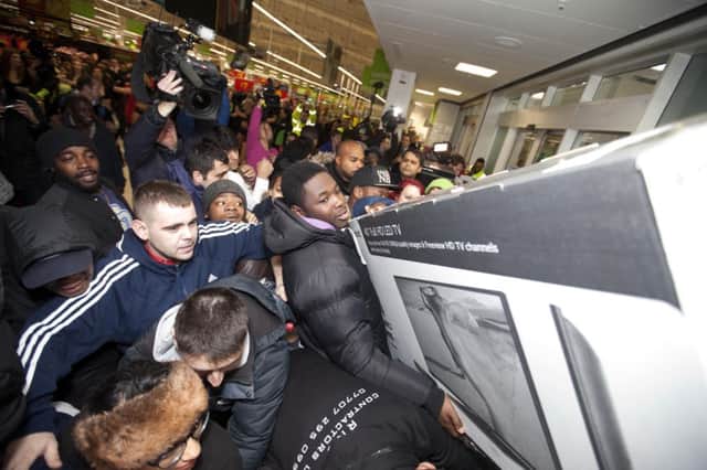 Black Friday saw chaotic scenes in stores around the UK as people grabbed bargains. Picture: David Parry/PA