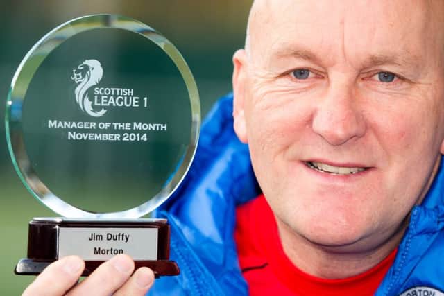 Jim Duffy displays his SPFL League 1 manager of the month award for November. Picture: SNS