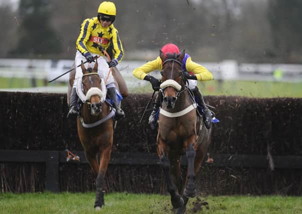 Theatrical Star, right, clears the last to win at Fontwell. Picture: Getty