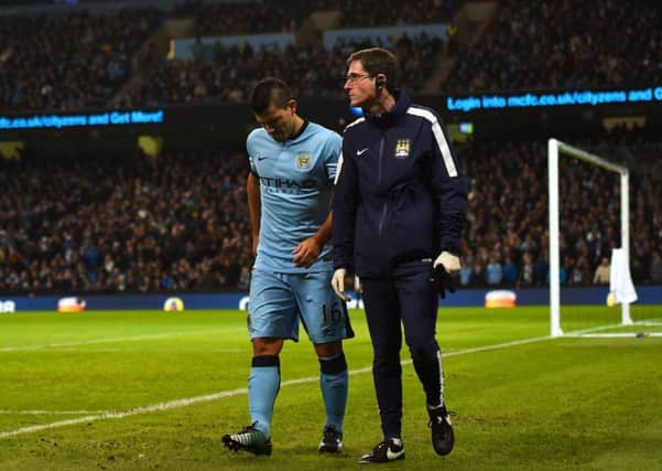 Sergio Aguero leaves the field injured during the game agaist Everton last weekend. Picture: Getty