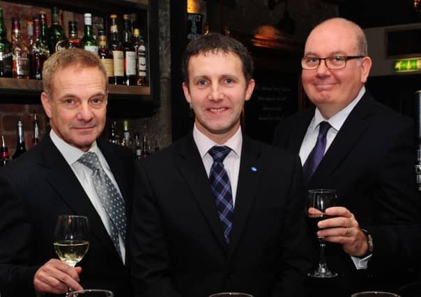 Paul Waterson, chief executive of the Scottish Licensed Trade Association, pictured with Public Health Minister Michael Matheson. Picture: TSPL