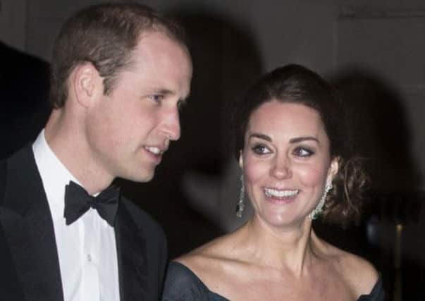 The Duchess, who is four months pregnant, arrives with Prince William for the dinner. Picture: AP