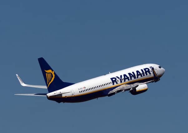 Ryanair celebrated carrying its 100,000th passenger from Glasgow Airport. Picture: Neil Hanna