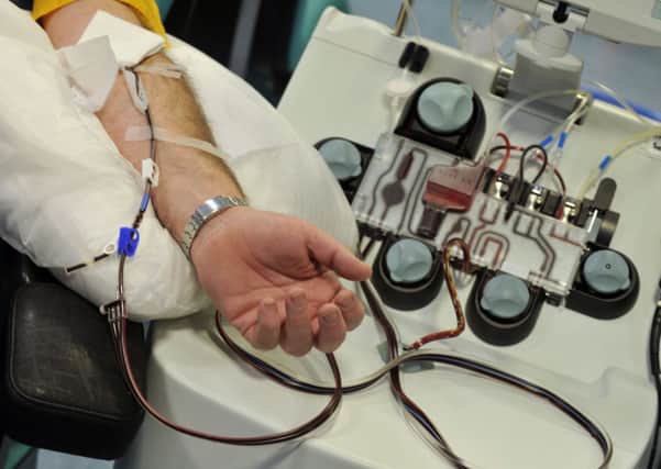 A patient undergoes a blood transfusion. A Scottish-led team of scientists are using stem cell technology to create fresh blood. Picture: Donald Macleod