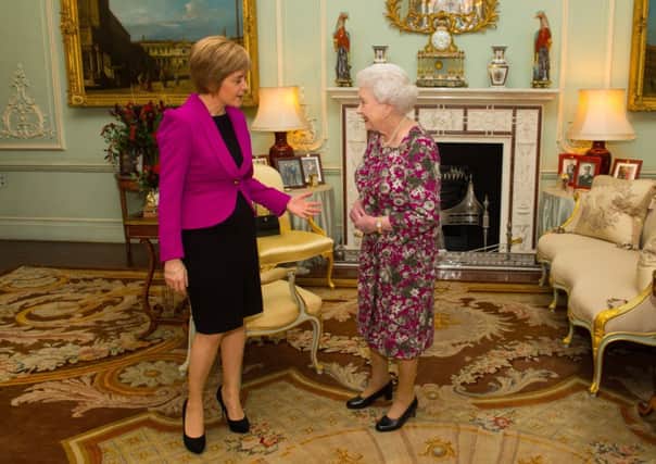 First Minister Nicola Sturgeon meets the Queen at Buckingham Palace, London. Picture: PA