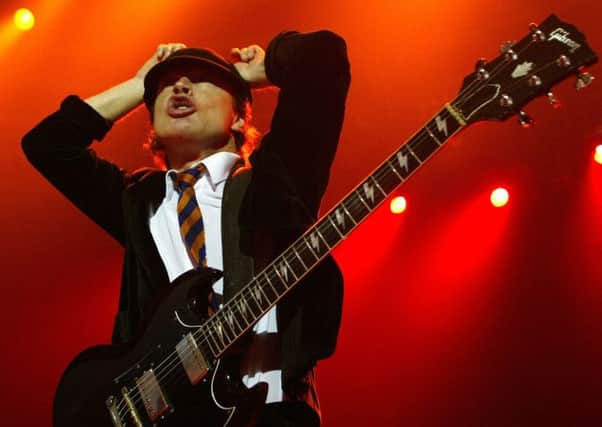 Angus Young, the AC/DC guitarist, performs on stage. Picture: AP