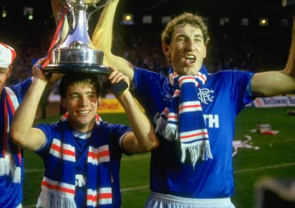 Terry Butcher (right) is one of the favourites to succeed his old Ibrox teammate. Picture: David Cannon/Allsport